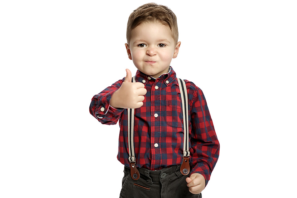 Kid with thumb up - image